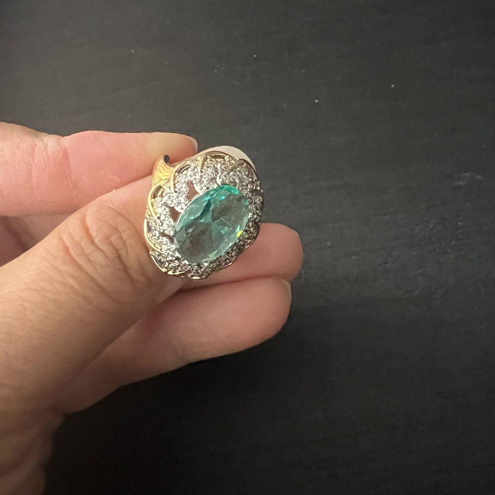 Elegant Gold and Silver Ring with Green Gemstone